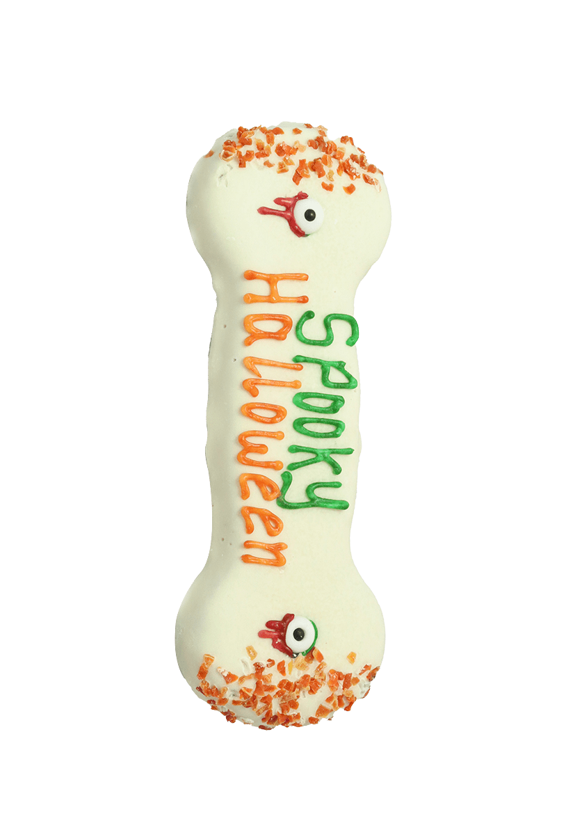 Halloween-themed dog biscuit with carrot sprinkles and yoghurt