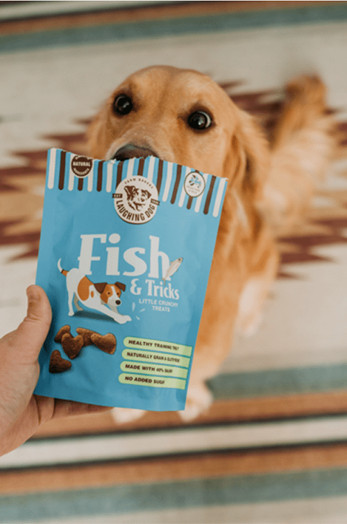 Dog with treat bag | Laughing Dog Food